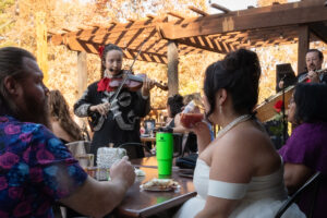 bride and groom at basecamp eureka springs on the deck