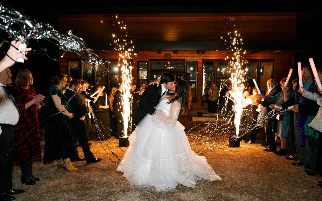 bride and groom kissing in eureka springs ar at basecamp event venue and restaurant