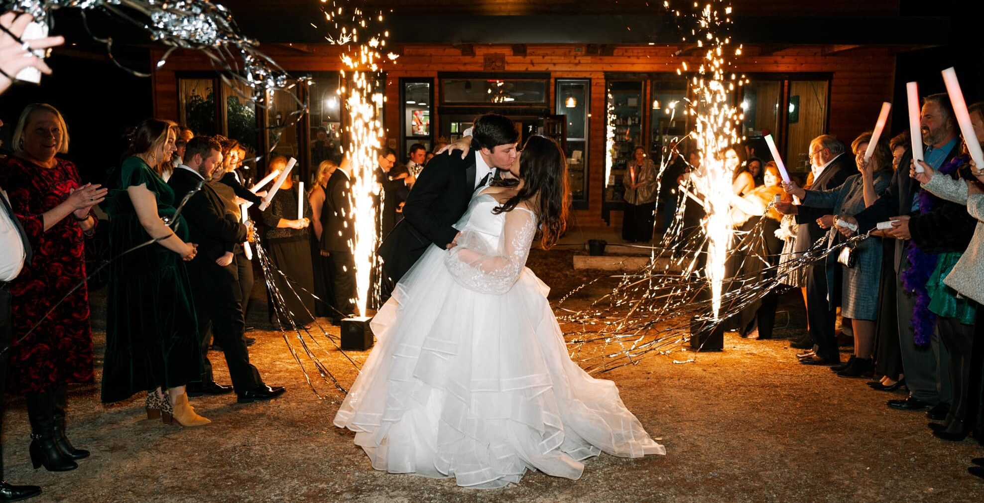 BaseCamp bride and groom kissing in eureka springs ar at basecamp event venue and restaurant